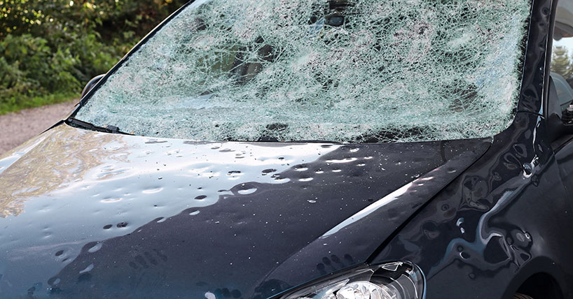 Hail damaged car