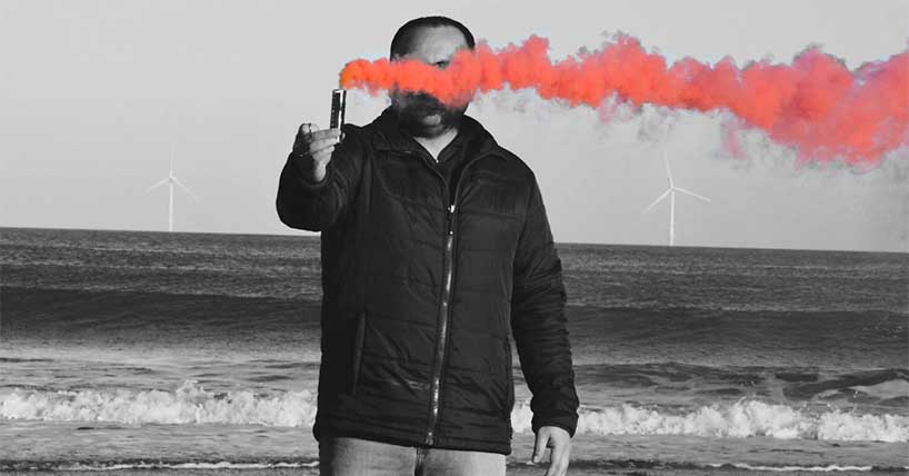 A man with a flare