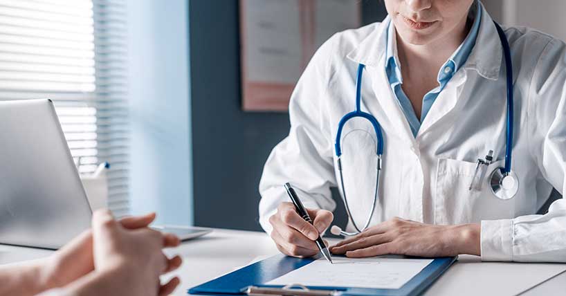 A doctor in a consultation.